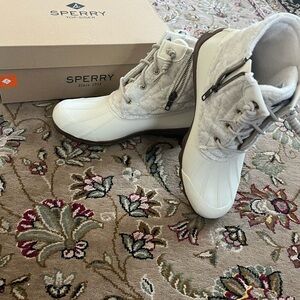 New in box, women’s quilted ivory boots by Sperry.  Size 9.5.